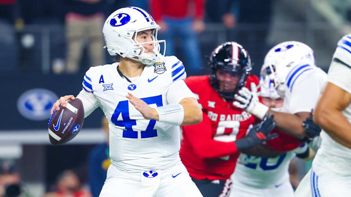 Dec 6, 2025; Arlington, TX, USA;  BYU Cougars quarterback Bear Bachmeier (47) throws during the first quarter against the Texas Tech Red Raiders at AT&T Stadium. Mandatory Credit: Kevin Jairaj-Imagn Images