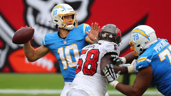 Justin Herbert and the Chargers are home favorites to the Buccaneers in Week 15.