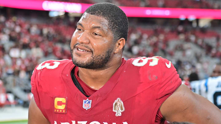 Cardinals defensive tackle Calais Campbell walks off the field after a win over the Panthers at State Farm Stadium.