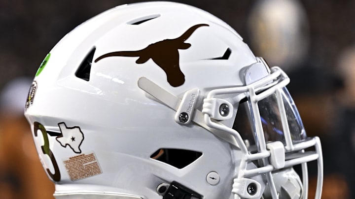Nov 30, 2024; College Station, Texas, USA; A detail view of a Texas Longhorns helmet on the sideline during the first quarter against the Texas A&M Aggies. The Longhorns defeated the Aggies 17-7 at Kyle Field. Mandatory Credit: Maria Lysaker-Imagn Images  