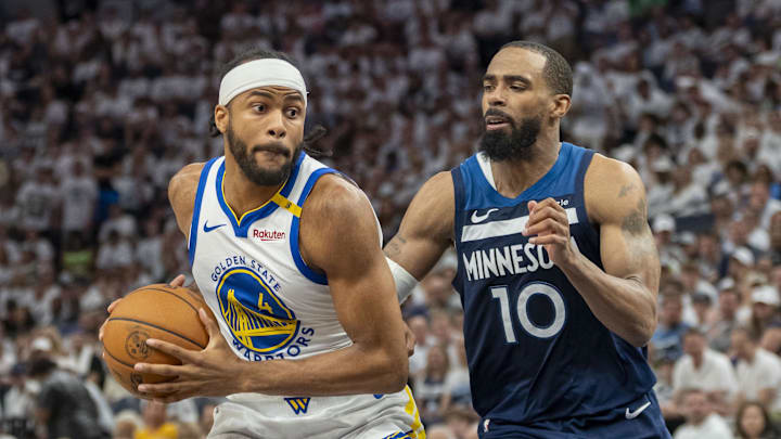 May 14, 2025; Minneapolis, Minnesota, USA; Golden State Warriors guard Moses Moody (4) drives to the basket past Minnesota Timberwolves guard Mike Conley (10) in the second half during game five of the second round for the 2025 NBA Playoffs at Target Center. Mandatory Credit: Jesse Johnson-Imagn Images May 14, 2025; Minneapolis, Minnesota, USA; Golden State Warriors guard Moses Moody (4) drives to the basket past Minnesota Timberwolves guard Mike Conley (10) in the second half during game five of the second round for the 2025 NBA Playoffs at Target Center. Mandatory Credit: Jesse Johnson-Imagn Images
