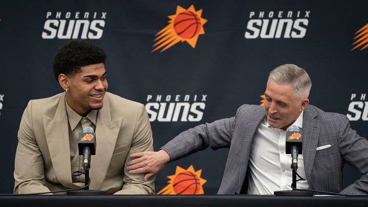 Koa Peat (left) with Suns GM Brian Gregory during an introductory press conference at the Verizon 5G Performance Center, in Phoenix, on June 26, 2026.