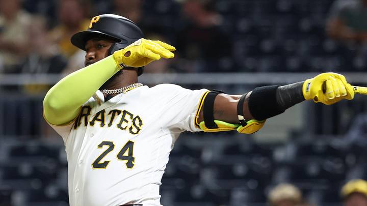 Apr 14, 2026; Pittsburgh, Pennsylvania, USA; Pittsburgh Pirates designated hitter Marcell Ozuna (24) hits an RBI double against the Washington Nationals during the fourth inning at PNC Park. Mandatory Credit: Charles LeClaire-Imagn Images