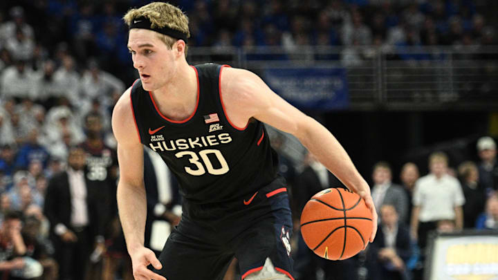 Feb 11, 2025; Omaha, Nebraska, USA; Connecticut Huskies forward Liam McNeeley (30) dribbles against the Creighton Bluejays during the first half at CHI Health Center Omaha. Mandatory Credit: Steven Branscombe-Imagn Images Feb 11, 2025; Omaha, Nebraska, USA; Connecticut Huskies forward Liam McNeeley (30) dribbles against the Creighton Bluejays during the first half at CHI Health Center Omaha. Mandatory Credit: Steven Branscombe-Imagn Images
