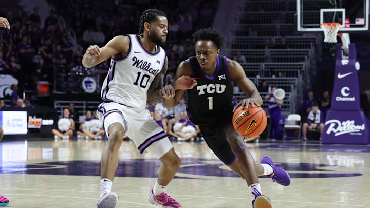 Feb 28, 2026; Manhattan, Kansas, USA; TCU Horned Frogs guard Jayden Pierre (1) is guarded by Kansas State Wildcats guard David Castillo (10) during the first half at Bramlage Coliseum. Feb 28, 2026; Manhattan, Kansas, USA; TCU Horned Frogs guard Jayden Pierre (1) is guarded by Kansas State Wildcats guard David Castillo (10) during the first half at Bramlage Coliseum.