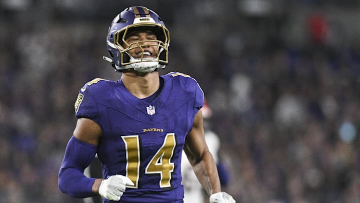 Nov 7, 2024; Baltimore, Maryland, USA; Baltimore Ravens safety Kyle Hamilton (14) reacts after tips a Cincinnati Bengals quarterback Joe Burrow (9) pass during the first quarter  at M&T Bank Stadium. Mandatory Credit: Tommy Gilligan-Imagn Images