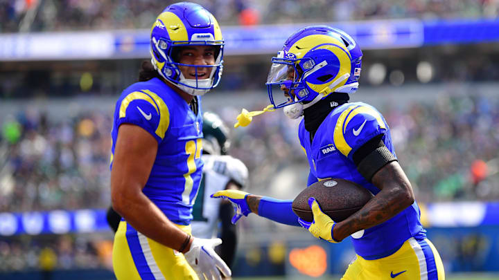 Oct 8, 2023; Inglewood, California, USA; Los Angeles Rams wide receiver Tutu Atwell (5) celebrates his touchdown scored against the Philadelphia Eagles with wide receiver Puka Nacua (17) during the first half at SoFi Stadium. Mandatory Credit: Gary A. Vasquez-Imagn Images