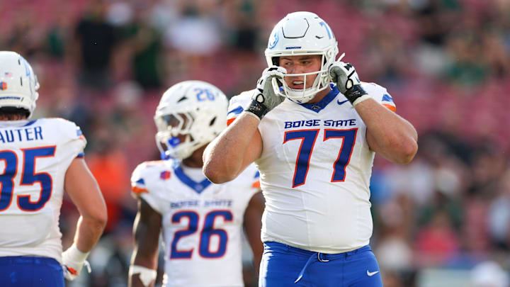 Aug 28, 2025; Tampa, Florida, USA; Boise State Broncos offensive lineman Kage Casey (77) looks on against the South Florida Bulls in the first quarter at Raymond James Stadium. Mandatory Credit: Nathan Ray Seebeck-Imagn Images