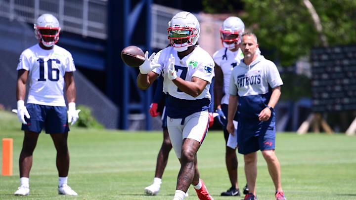 Jun 10, 2024; Foxborough, MA, USA;  New England Patriots wide receiver JuJu Smith-Schuster (7) makes a catch at minicamp at Gillette Stadium. Mandatory Credit: Eric Canha-USA TODAY Sports