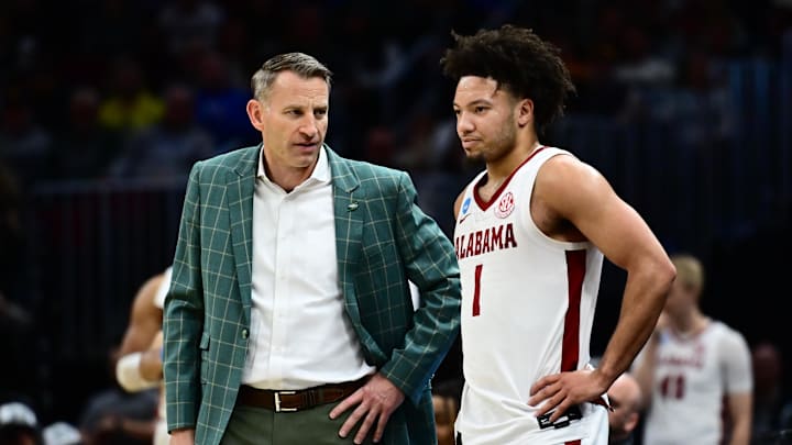 Mar 23, 2025; Cleveland, OH, USA; Alabama Crimson Tide head coach Nate Oats coaches guard Mark Sears (1) in the second half against the St. Mary's Gaels during the NCAA Tournament Second Round at Rocket Arena. Mandatory Credit: Ken Blaze-Imagn Images