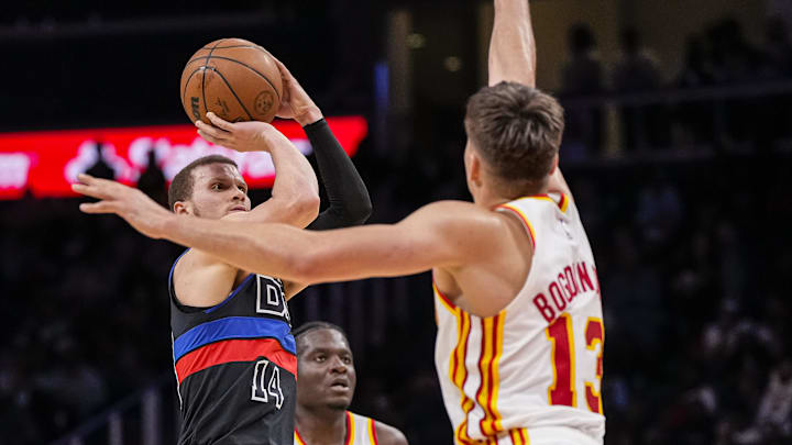 Apr 3, 2024; Atlanta, Georgia, USA; Detroit Pistons guard Malachi Flynn (14) shoots against Atlanta Apr 3, 2024; Atlanta, Georgia, USA; Detroit Pistons guard Malachi Flynn (14) shoots against Atlanta