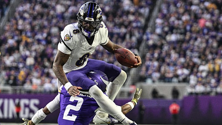 Nov 9, 2025; Minneapolis, Minnesota, USA; Baltimore Ravens quarterback Lamar Jackson (8) runs the ball as Minnesota Vikings cornerback Isaiah Rodgers (2) makes the tackle during the third quarter at U.S. Bank Stadium. Mandatory Credit: Jeffrey Becker-Imagn Images Nov 9, 2025; Minneapolis, Minnesota, USA; Baltimore Ravens quarterback Lamar Jackson (8) runs the ball as Minnesota Vikings cornerback Isaiah Rodgers (2) makes the tackle during the third quarter at U.S. Bank Stadium. Mandatory Credit: Jeffrey Becker-Imagn Images