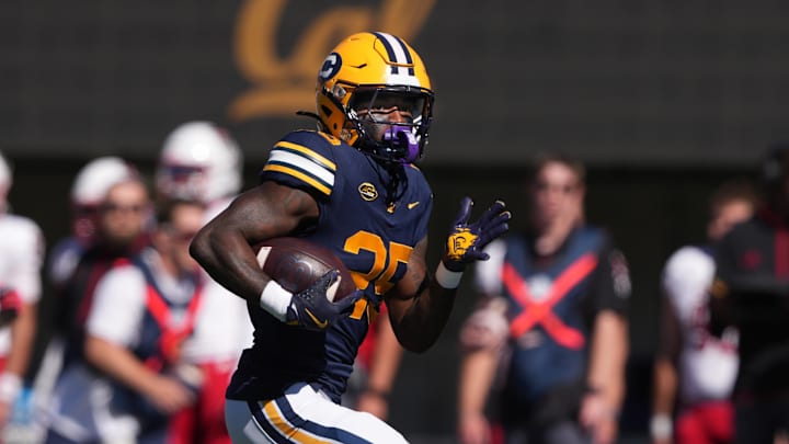 Oct 19, 2024; Berkeley, California, USA; California Golden Bears running back Jaivian Thomas (25) rushes for a touchdown against the North Carolina State Wolfpack during the first quarter at California Memorial Stadium. Mandatory Credit: Darren Yamashita-Imagn Images