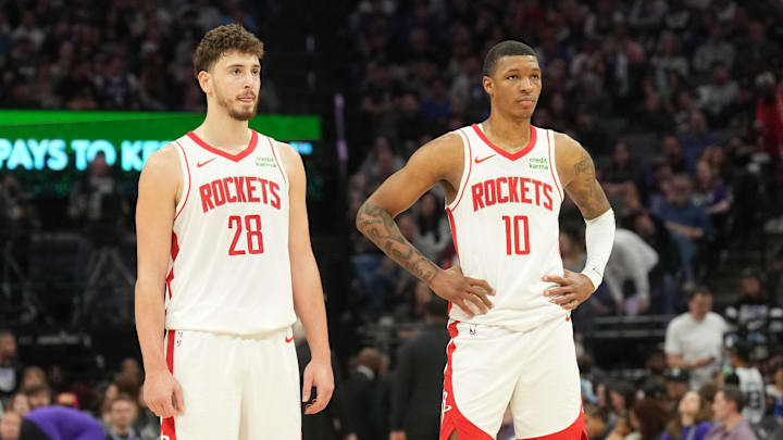 Mar 10, 2024; Sacramento, California, USA; Houston Rockets center Alperen Sengun (28) and forward Jabari Smith Jr. (10) stand on the court during the third quarter against the Sacramento Kings at Golden 1 Center. Mandatory Credit: Darren Yamashita-Imagn Images