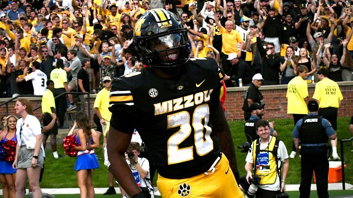 Sep 6, 2025; Columbia, Missouri, USA; Missouri Tigers running back Jamal Roberts (20) celebrates after a touchdown in the second half of the Border War against the Kansas Jayhawks at Faurot Field at Memorial Stadium.