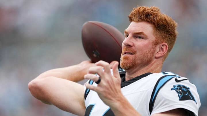 Oct 5, 2025; Charlotte, North Carolina, USA; Carolina Panthers quarterback Andy Dalton (14) warms up during the first quarter against the Miami Dolphins at Bank of America Stadium. Mandatory Credit: Cory Knowlton-Imagn Images Oct 5, 2025; Charlotte, North Carolina, USA; Carolina Panthers quarterback Andy Dalton (14) warms up during the first quarter against the Miami Dolphins at Bank of America Stadium. Mandatory Credit: Cory Knowlton-Imagn Images