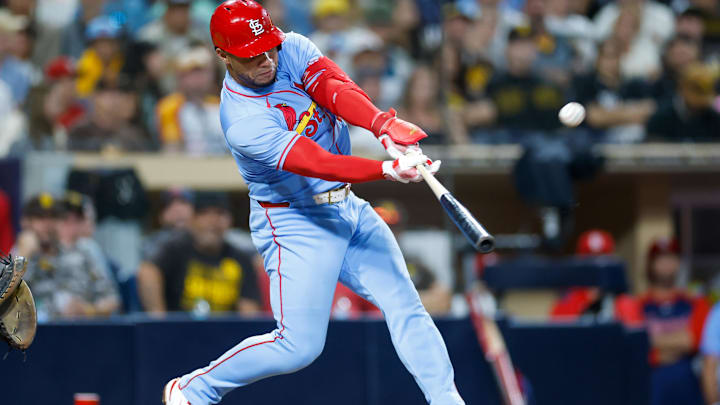 Aug 2, 2025; San Diego, California, USA; St. Louis Cardinals first baseman Willson Contreras (40) hits a sacrifice fly during the ninth inning against the San Diego Padres at Petco Park. Mandatory Credit: David Frerker-Imagn Images Aug 2, 2025; San Diego, California, USA; St. Louis Cardinals first baseman Willson Contreras (40) hits a sacrifice fly during the ninth inning against the San Diego Padres at Petco Park. Mandatory Credit: David Frerker-Imagn Images