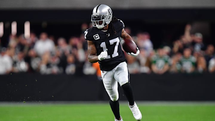 Nov 12, 2023; Paradise, Nevada, USA; Las Vegas Raiders wide receiver Davante Adams (17) runs the ball against the New York Jets during the first half at Allegiant Stadium. Mandatory Credit: Gary A. Vasquez-Imagn Images