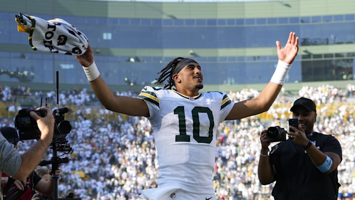 Love celebrates Green Bay's last-second win over Houston on Sunday.