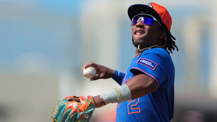 Feb 25, 2025; West Palm Beach, Florida, USA; New York Mets shortstop Luisangel Acuna (2) throws a baseball into the stands after the second inning against the Houston Astros at CACTI Park of the Palm Beaches. Mandatory Credit: Sam Navarro-Imagn Images