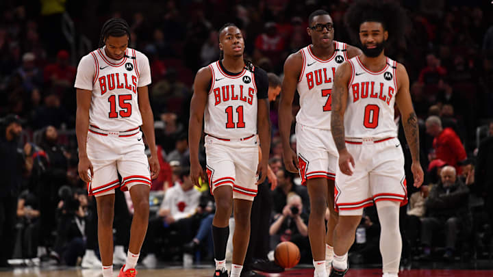 Feb 28, 2025; Chicago, Illinois, USA; (from left to right) Chicago Bulls forward Julian Phillips, guard Ayo Dosunmu, forward Jalen Smith, and guard Coby White are seen during a game against the Toronto Raptors at the United Center. Mandatory Credit: Patrick Gorski-Imagn Images