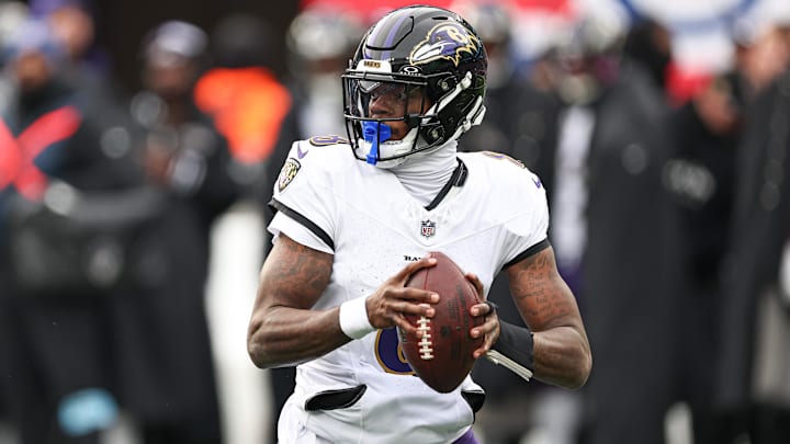 Dec 15, 2024; East Rutherford, New Jersey, USA; Baltimore Ravens quarterback Lamar Jackson (8) scrambles during the first quarter against the New York Giants at MetLife Stadium. Mandatory Credit: Vincent Carchietta-Imagn Images