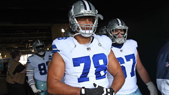 Dallas Cowboys offensive tackle Terence Steele and center Brock Hoffman before a game against the Philadelphia Eagles