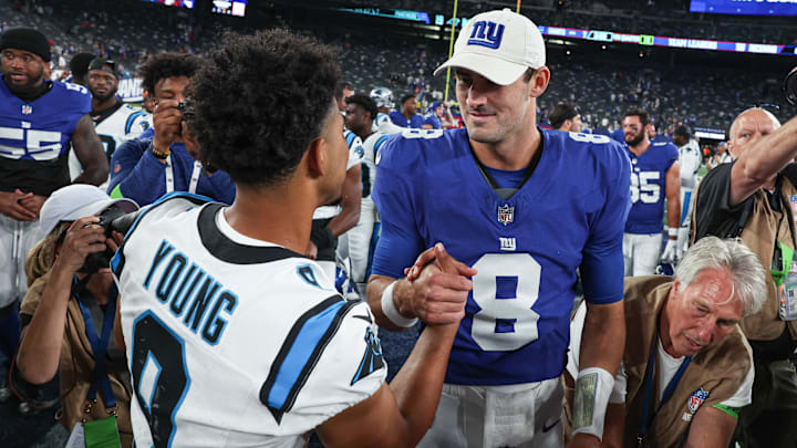 Aug 18, 2023; East Rutherford, New Jersey, USA; Carolina Panthers quarterback Bryce Young (9) shakes hands with New York Giants quarterback Daniel Jones (8) after the preseason game at MetLife Stadium. Mandatory Credit: Vincent Carchietta-Imagn Images