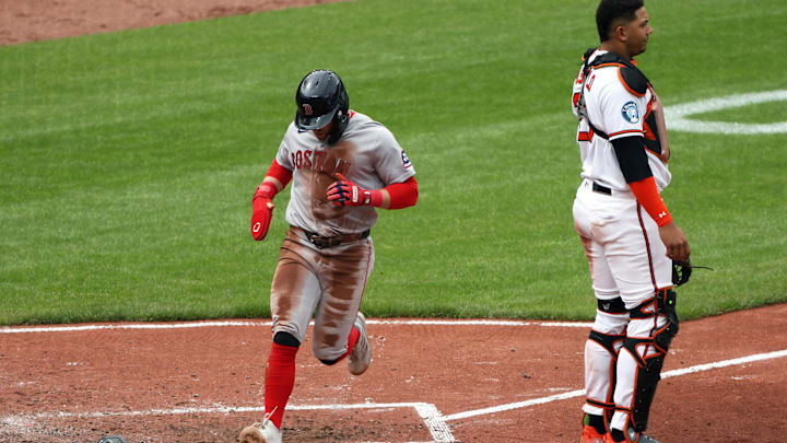 Apr 26, 2026; Baltimore, Maryland, USA; Boston Red Sox third baseman Caleb Durbin (5) scores during the fifth inning against the Baltimore Orioles at Oriole Park at Camden Yards. Mandatory Credit: Daniel Kucin Jr.-Imagn Images
