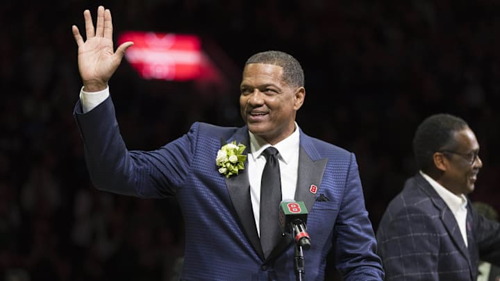 Mar 24, 2019; Milwaukee, WI, USA; Milwaukee Bucks former player Marques Johnson waves to the crowd during a halftime ceremony to retire his jersey during a game between the Bucks and the Cleveland Cavaliers at Fiserv Forum. Mandatory Credit: Jeff Hanisch-Imagn Images