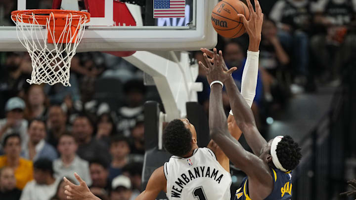 Oct 17, 2025; San Antonio, Texas, USA; San Antonio Spurs forward Victor Wembanyama (1) blocks the shot by Indiana Pacers forward Pascal Siakam (43) during the first half at Frost Bank Center. Mandatory Credit: Scott Wachter-Imagn Images