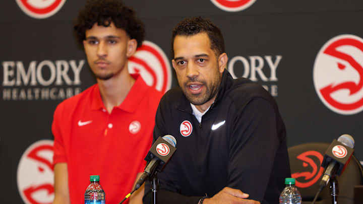 Jun 28, 2024; Atlanta, Georgia, USA; Atlanta Hawks general manager Landry Fields talks to the media with first overall pick Zaccharie Risacher at the Emory Sports Medicine Complex. Mandatory Credit: Brett Davis-Imagn Images
