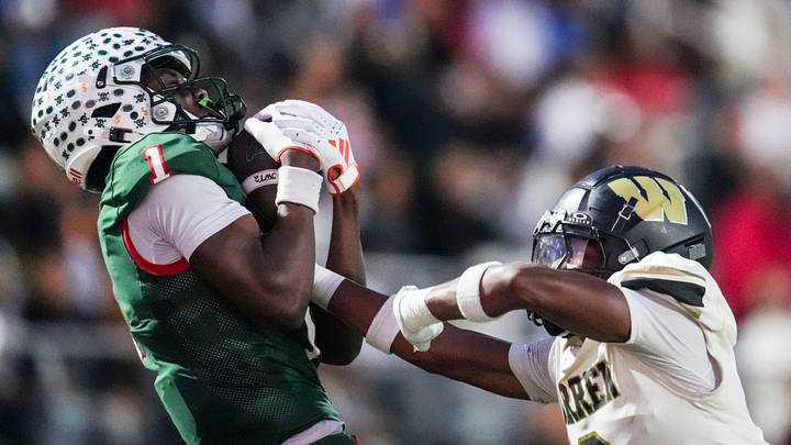 Lawrence North Wildcats Monshun Sales (1) catches a pass against Warren Central Terrell Harris (2) on Friday, Oct. 3, 2025, during a game between the Lawrence North Wildcats and Warren Central at Lawrence North High School in Indianapolis. Lawrence North Wildcats Monshun Sales (1) catches a pass against Warren Central Terrell Harris (2) on Friday, Oct. 3, 2025, during a game between the Lawrence North Wildcats and Warren Central at Lawrence North High School in Indianapolis.