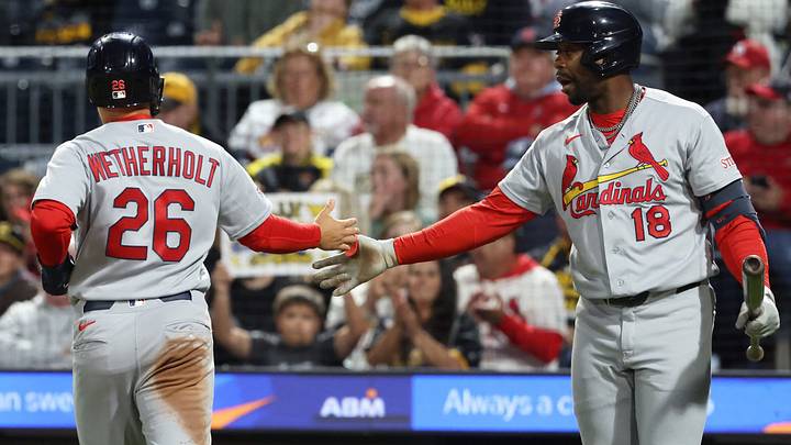 Sep 23, 2026; Pittsburgh, Pennsylvania, USA;  St. Louis Cardinals right fielder Jordan Walker (18) greets second baseman JJ Wetherholt (26) crossing home plate to score a run against the Pittsburgh Pirates during the third inning at PNC Park.  Mandatory Credit: Charles LeClaire-Imagn Images