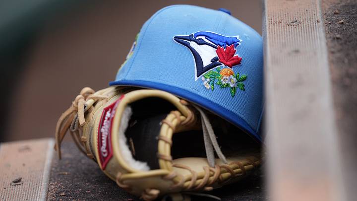 Mar 16, 2026; Jupiter, Florida, USA; Detail photo. A Toronto Blue Jays hat and glove rest on the first base dugout steps at Roger Dean Chevrolet Stadium before the game against the Miami Marlins. Mandatory Credit: Jim Rassol-Imagn Images Mar 16, 2026; Jupiter, Florida, USA; Detail photo. A Toronto Blue Jays hat and glove rest on the first base dugout steps at Roger Dean Chevrolet Stadium before the game against the Miami Marlins. Mandatory Credit: Jim Rassol-Imagn Images