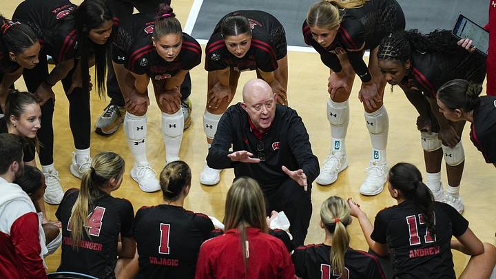 Dec 18, 2025; Kansas City, MO, USA; Wisconsin Badgers head coach Kelly Sheffield talks to his players during a timeout in the third set against the Kentucky Wildcats in a 2025 NCAA Women’s Volleyball Championship semifinal match at T-Mobile Center. Mandatory Credit: Jay Biggerstaff-Imagn Images