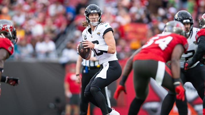 Dec 24, 2023; Tampa, Florida, USA; Jacksonville Jaguars quarterback Trevor Lawrence (16) get set to