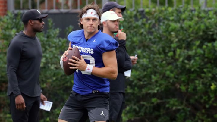 Oklahoma quarterback John Mateer warms up during the Sooners' second practice of fall camp.
