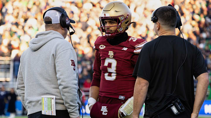 Nov 1, 2025; Chestnut Hill, Massachusetts, USA; Boston College Eagles head coach Bill O’Brien (left) talks to quarterback Grayson James (3) in the second quarter against the Notre Dame Fighting Irish at Alumni Stadium. Mandatory Credit: Edward Finan-Imagn Images