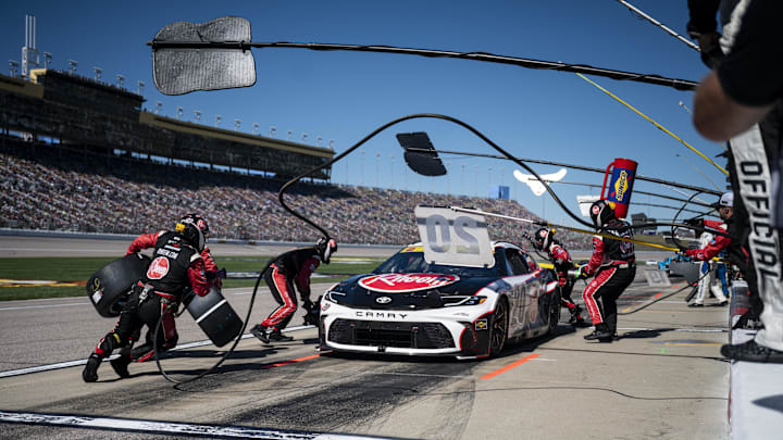 NASCAR Cup Series driver Christopher Bell (20) makes a pit stop during the 2024 Hollywood Casino 400 at Kansas Speedway. NASCAR Cup Series driver Christopher Bell (20) makes a pit stop during the 2024 Hollywood Casino 400 at Kansas Speedway.