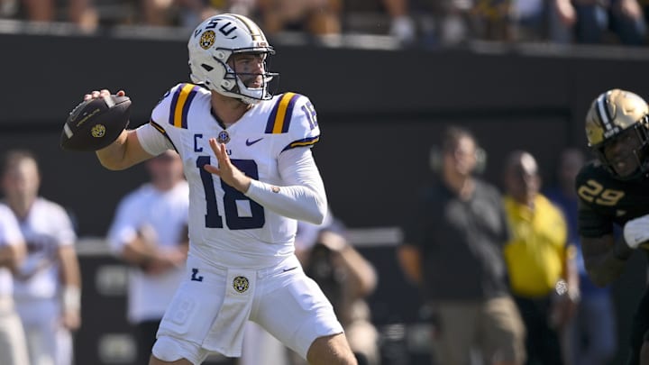 Oct 18, 2025; Nashville, Tennessee, USA;  Louisiana State Tigers quarterback Garrett Nussmeier (18) stands in the pocket against the Vanderbilt Commodores during the first half at FirstBank Stadium. Mandatory Credit: Steve Roberts-Imagn Images