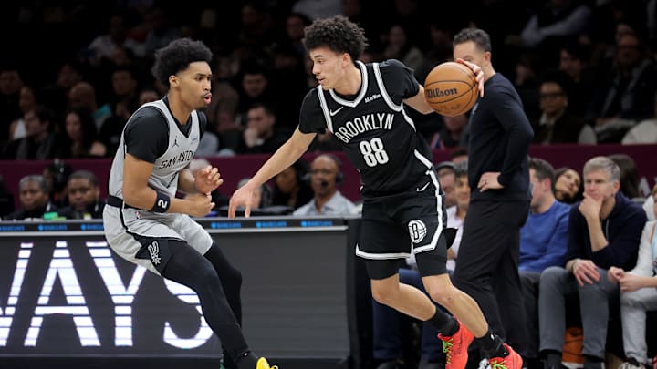 Feb 26, 2026; Brooklyn, New York, USA; Brooklyn Nets guard Nolan Traore (88) controls the ball against San Antonio Spurs guard Dylan Harper (2) during the first quarter at Barclays Center. Mandatory Credit: Brad Penner-Imagn Images Feb 26, 2026; Brooklyn, New York, USA; Brooklyn Nets guard Nolan Traore (88) controls the ball against San Antonio Spurs guard Dylan Harper (2) during the first quarter at Barclays Center. Mandatory Credit: Brad Penner-Imagn Images
