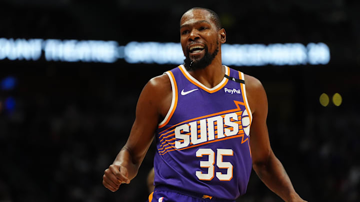 Dec 23, 2024; Denver, Colorado, USA; Phoenix Suns forward Kevin Durant (35) reacts towards the Denver Nuggets bench in the first quarter at Ball Arena. Mandatory Credit: Ron Chenoy-Imagn Images