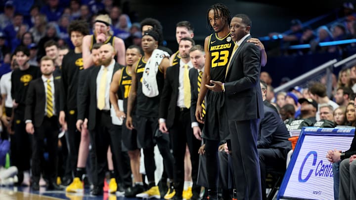 Missouri Head Coach Dennis Gates talks to his players as he prepares to sub them in, in a game last season.