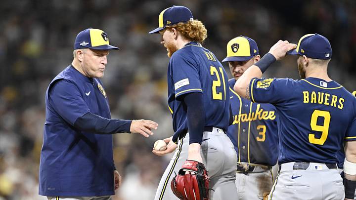 Oct 6, 2026; San Diego, California, USA;  Milwaukee Brewers manager Pat Murphy (00) pulls Milwaukee Brewers pitcher Dustin May (21) from the game during the fourth inning against the San Diego Padres in game three of the NLDS for the 2026 MLB Playoffs at Petco Park.  Mandatory Credit: Denis Poroy-Imagn Images