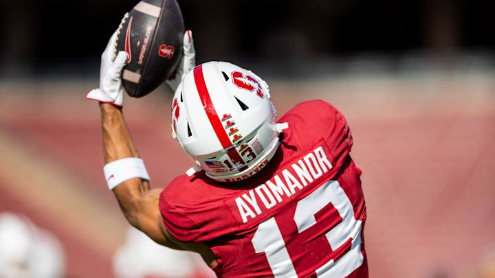 Nov 16, 2024; Stanford, California, USA; Stanford Cardinal wide receiver Elic Ayomanor (13) catches a pass in warmup before the game against the Louisville Cardinals at Stanford Stadium. Mandatory Credit: Bob Kupbens-Imagn Images