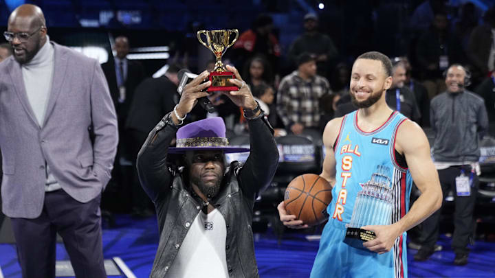 Kevin Hart receives a trophy during the 2025 NBA All Star Game at Chase Center.