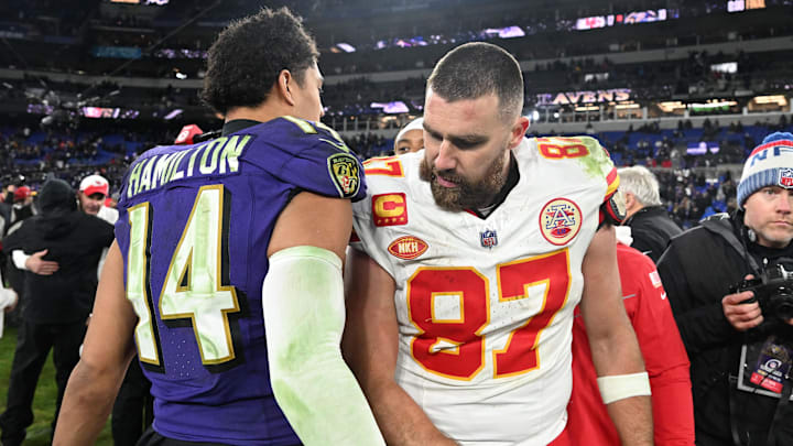Jan 28, 2024; Baltimore, Maryland, USA; Kansas City Chiefs tight end Travis Kelce (87) greets Baltimore Ravens safety Kyle Hamilton (14) after their AFC Championship football game at M&T Bank Stadium. Mandatory Credit: Tommy Gilligan-Imagn Images