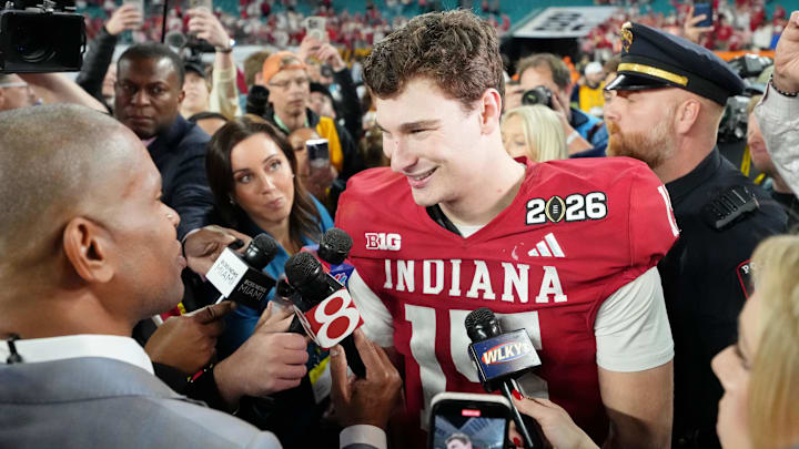 Jan 19, 2026; Miami Gardens, FL, USA; Indiana Hoosiers quarterback Fernando Mendoza (15) is interviewed after winning the College Football Playoff National Championship game at Hard Rock Stadium. Mandatory Credit: Kirby Lee-Imagn Images Jan 19, 2026; Miami Gardens, FL, USA; Indiana Hoosiers quarterback Fernando Mendoza (15) is interviewed after winning the College Football Playoff National Championship game at Hard Rock Stadium. Mandatory Credit: Kirby Lee-Imagn Images