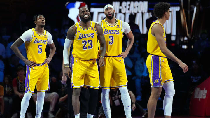 Dec 9, 2023; Las Vegas, Nevada, USA; Los Angeles Lakers forward LeBron James (23) and forward Cam Reddish (5) and forward Anthony Davis (3) look on after a play against the Indiana Pacers in the fourth quarter of the in season tournament championship final at T-Mobile Arena. Mandatory Credit: Kyle Terada-USA TODAY Sports